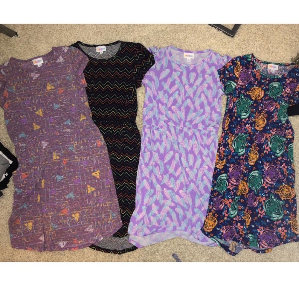 SOLD LuLaRoe girls dresses with side pockets.10&12